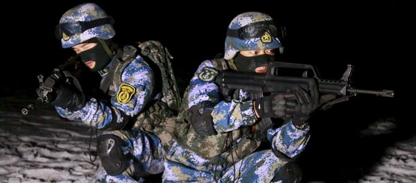 Soldiers of the People's Liberation Army (PLA) Marine Corps are seen in training at a military training base in Xinjiang Uighur Autonomous Region Soldiers of the People's Liberation Army (PLA) Marine Corps are seen in training at a military training base in Xinjiang Uighur Autonomous Region - Sputnik International