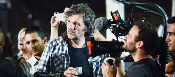 Serbian filmmaker Emir Kusturica, center, stands next to a cameraman while documenting the inauguration of an agricultural trade school that borders the family farm of former President Jose Mujica, on the outskirts of Montevideo, Uruguay, Thursday, March 5, 2015 Serbian filmmaker Emir Kusturica, center, stands next to a cameraman while documenting the inauguration of an agricultural trade school that borders the family farm of former President Jose Mujica, on the outskirts of Montevideo, Uruguay, Thursday, March 5, 2015 - Sputnik International