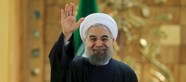 Iranian President Hassan Rouhani waves during a news conference in Tehran, Iran January 17, 2016. Iranian President Hassan Rouhani waves during a news conference in Tehran, Iran January 17, 2016. - Sputnik International