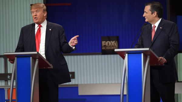 Republican Presidential candidate businessman Donald Trump (L) speaks next to Texas Senator Ted Cruz during the Republican Presidential debate sponsored by Fox Business and the Republican National Committee at the North Charleston Coliseum and Performing Arts Center in Charleston, South Carolina on January 14, 2016 Republican Presidential candidate businessman Donald Trump (L) speaks next to Texas Senator Ted Cruz during the Republican Presidential debate sponsored by Fox Business and the Republican National Committee at the North Charleston Coliseum and Performing Arts Center in Charleston, South Carolina on January 14, 2016 - Sputnik International