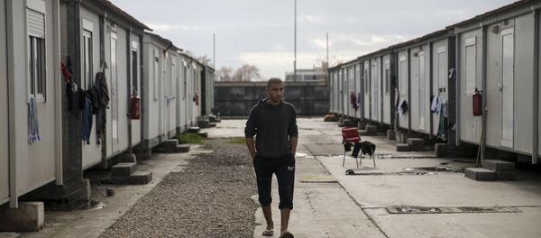 A refugee walks inside the Eleonas refugee camp in Athens, Greece, January 5, 2016 A refugee walks inside the Eleonas refugee camp in Athens, Greece, January 5, 2016 - Sputnik International