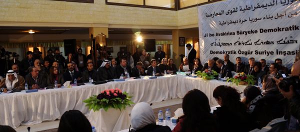 A picture taken on December 8, 2015 shows a general view of the two-day Syrian Democratic Conference in Al-Malikiyeh, a town in Syria's northeastern Hasakeh province, held by Kurdish factions to discuss a vision for Syria's future. Dozens of Kurdish, Arab, and Assyrian figures attended the conference including members of Syria's leading Kurdish movement, the Democratic Union Party (PYD), A picture taken on December 8, 2015 shows a general view of the two-day Syrian Democratic Conference in Al-Malikiyeh, a town in Syria's northeastern Hasakeh province, held by Kurdish factions to discuss a vision for Syria's future. Dozens of Kurdish, Arab, and Assyrian figures attended the conference including members of Syria's leading Kurdish movement, the Democratic Union Party (PYD), - Sputnik International
