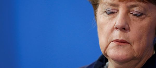 German Chancellor Angela Merkel listens during a joint news conference with Romania's Prime Minister Dacian Ciolos (not pictured) at the Chancellery in Berlin, Germany, January 7, 2016. German Chancellor Angela Merkel listens during a joint news conference with Romania's Prime Minister Dacian Ciolos (not pictured) at the Chancellery in Berlin, Germany, January 7, 2016. - Sputnik International