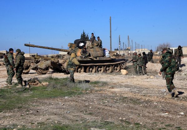 Syrian pro-government troops hold positions in the Syrian town of Ain al-Hanash near l-Bab in Aleppo's eastern countryside on January 26, 2015 as regime forces have recaptured the area from Islamist jihadists Syrian pro-government troops hold positions in the Syrian town of Ain al-Hanash near l-Bab in Aleppo's eastern countryside on January 26, 2015 as regime forces have recaptured the area from Islamist jihadists - Sputnik International