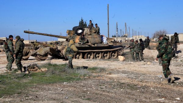 Syrian pro-government troops hold positions in the Syrian town of Ain al-Hanash near l-Bab in Aleppo's eastern countryside on January 26, 2015 as regime forces have recaptured the area from Islamist jihadists - Sputnik International