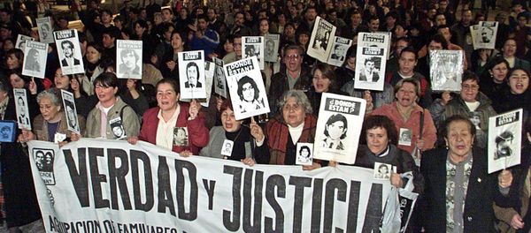 Relatives of victims of the Pinochet regime and members of human right groups (File) Relatives of victims of the Pinochet regime and members of human right groups (File) - Sputnik International