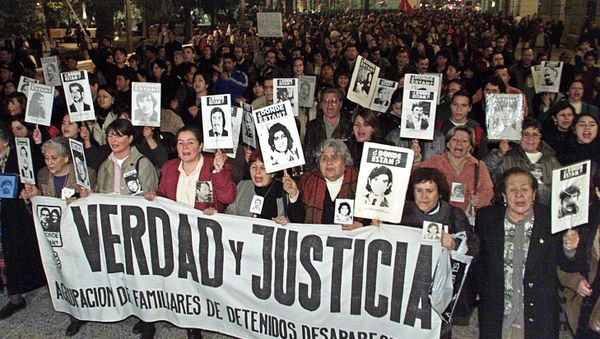 Relatives of victims of the Pinochet regime and members of human right groups (File) Relatives of victims of the Pinochet regime and members of human right groups (File) - Sputnik International