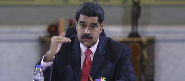 Venezuela's President Nicolas Maduro speaks during a meeting with deputies of Venezuela's United Socialist Party (PSUV) and ministers at Miraflores Palace in Caracas, in this handout picture provided by Miraflores Palace on January 22, 2016 - Sputnik International