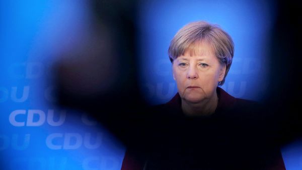 German chancellor Angela Merkel speaks during a press conference after a meeting with leading politicians at her CDU party in Mayence, central Germany, on January 9, 2016 - Sputnik International