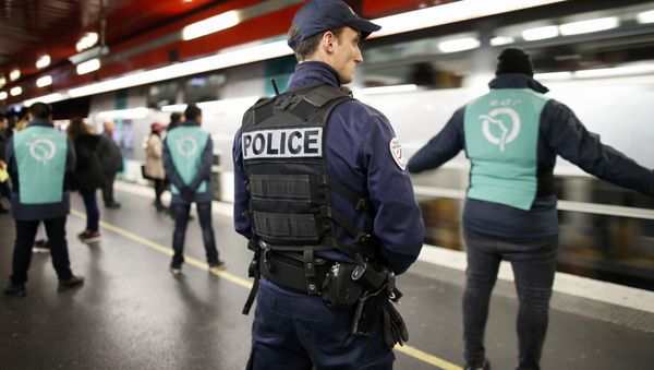 A policeman patrols inside the RER (suburban rapid transit) station of Auber in Paris, France, December 30, 2015, as a security alert continues during the Christmas and New Year holiday season following the November shooting attacks in the French capital. A policeman patrols inside the RER (suburban rapid transit) station of Auber in Paris, France, December 30, 2015, as a security alert continues during the Christmas and New Year holiday season following the November shooting attacks in the French capital. - Sputnik International