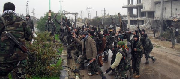 Syrian pro-government forces celebrate on a street in the town of Sheikh Miskeen in southern Daraa province on January 26, 2016 after they retook the strategic town from rebel forces Syrian pro-government forces celebrate on a street in the town of Sheikh Miskeen in southern Daraa province on January 26, 2016 after they retook the strategic town from rebel forces - Sputnik International