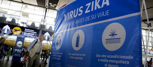 A banner is seen during an information campaign on Zika virus by the Chilean Health Ministry at the departures area of Santiago's international airport, Chile, January 28, 2016 - Sputnik International