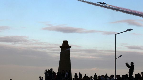 The Turkish Air Force, Turkish Stars aerobatic demonstration team, perform during celebrations of the 31st anniversary of proclamation of the Turkish Republic of Northern Cyprus (TRNC) on November 16,2014, in the Turkish occupied north of the Eastern Mediterranean Island in Kyrenia - Sputnik International