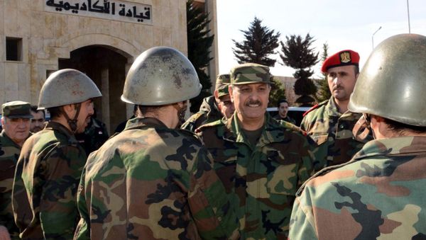 Syria's General Fahd Jassem al-Freij (C), Deputy Commander-in-Chief of the Army and the Armed Forces and Minister of Defense allegedly visiting troops in the northern Syrian city of Aleppo. (File) Syria's General Fahd Jassem al-Freij (C), Deputy Commander-in-Chief of the Army and the Armed Forces and Minister of Defense allegedly visiting troops in the northern Syrian city of Aleppo. (File) - Sputnik International