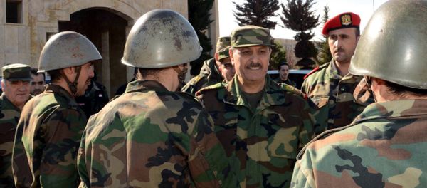 Syria's General Fahd Jassem al-Freij (C), Deputy Commander-in-Chief of the Army and the Armed Forces and Minister of Defense allegedly visiting troops in the northern Syrian city of Aleppo. (File) Syria's General Fahd Jassem al-Freij (C), Deputy Commander-in-Chief of the Army and the Armed Forces and Minister of Defense allegedly visiting troops in the northern Syrian city of Aleppo. (File) - Sputnik International