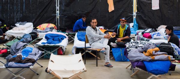 Refugees are seen in their temporary housing in a former hardware store in Hamburg, northern Germany. - Sputnik International