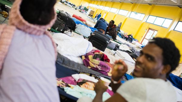 Refugees are seen in their temporary housing in a former hardware store in Hamburg, northern Germany - Sputnik International