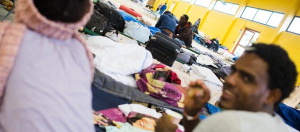 Refugees are seen in their temporary housing in a former hardware store in Hamburg, northern Germany - Sputnik International