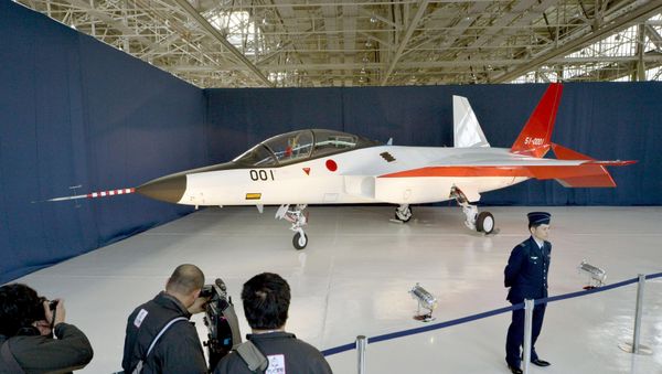 A prototype of the first Japan-made stealth fighter is pictured at a Mitsubishi Heavy Industries' factory in Toyoyama town, Aichi Prefecture, central Japan, in this photo taken by Kyodo January 28, 2016 A prototype of the first Japan-made stealth fighter is pictured at a Mitsubishi Heavy Industries' factory in Toyoyama town, Aichi Prefecture, central Japan, in this photo taken by Kyodo January 28, 2016 - Sputnik International