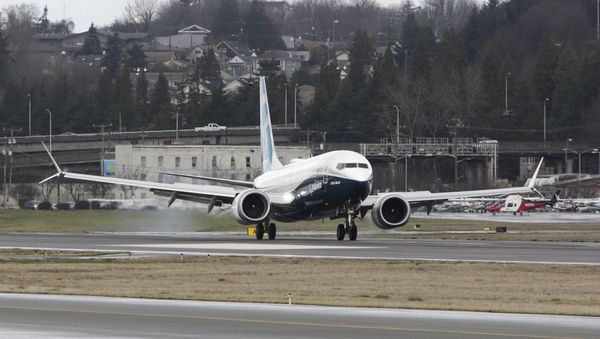 A Boeing 737 MAX returns from a flight test at Boeing Field in Seattle, Washington - Sputnik International