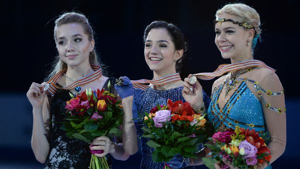 Medalists of the women's free skating program at the European Figure Skating Championships in Bratislava, Slovakia, during the awards ceremony, from left: Elena Radionova (Russia) - silver medal; Evgenia Medvedeva (Russia) - gold medal; Anna Pogorilaya (Russia) - bronze medal - Sputnik International