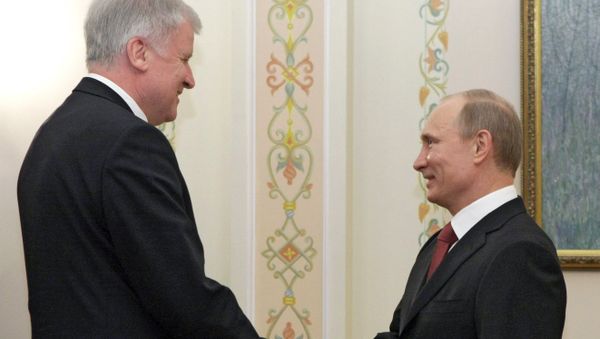 Prime Minister Vladimir Putin meets with his Bavarian counterpart Horst Seehofer Prime Minister Vladimir Putin meets with his Bavarian counterpart Horst Seehofer - Sputnik International