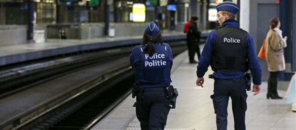 Belgian police officers patrol on a platform at the Thalys high-speed train terminal at Midi/Zuid railway station in Brussels, Belgium, January 7, 2016 - Sputnik International
