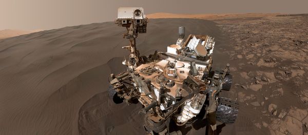 This Image obtained January 31, 2016 from NASA shows a self-portrait of NASA's Curiosity Mars rover vehicle at Namib Dune, where the rover's activities included scuffing into the dune with a wheel and scooping samples of sand for laboratory analysis. - Sputnik International
