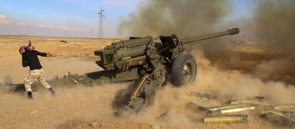 In this photo taken on Saturday, Jan. 30, 2016, Syrian government troops fire at Islamic State group positions near Mahin, Syria In this photo taken on Saturday, Jan. 30, 2016, Syrian government troops fire at Islamic State group positions near Mahin, Syria - Sputnik International