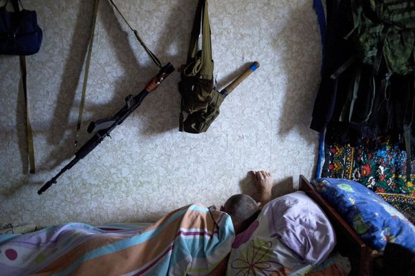 A member of a rapid response unit rests in a barrack before a curfew patrol in Lugansk - Sputnik International