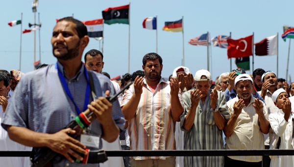 Libyans pray during Friday prayers, in the rebel-held Benghazi, Libya, Friday, July 8, 2011. Libyans pray during Friday prayers, in the rebel-held Benghazi, Libya, Friday, July 8, 2011. - Sputnik International