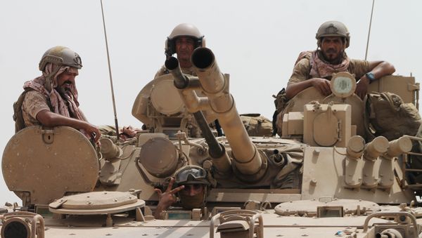 Soldiers stand on a tank of the Saudi-led coalition deployed on the outskirts of the southern Yemeni port city of Aden on August 3, 2015, during a military operation against Shiite Huthi rebels and their allies. Soldiers stand on a tank of the Saudi-led coalition deployed on the outskirts of the southern Yemeni port city of Aden on August 3, 2015, during a military operation against Shiite Huthi rebels and their allies. - Sputnik International