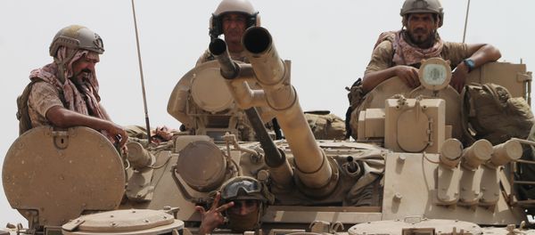 Soldiers stand on a tank of the Saudi-led coalition deployed on the outskirts of the southern Yemeni port city of Aden on August 3, 2015, during a military operation against Shiite Huthi rebels and their allies. Soldiers stand on a tank of the Saudi-led coalition deployed on the outskirts of the southern Yemeni port city of Aden on August 3, 2015, during a military operation against Shiite Huthi rebels and their allies. - Sputnik International