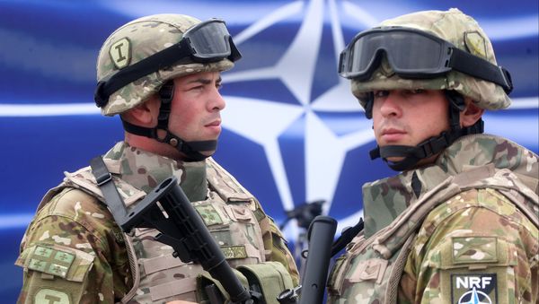 Georgian servicemen stand at the opening of a joint NATO-Georgia training center outside Tbilisi, Georgia, Thursday, Aug. 27, 2015 - Sputnik International