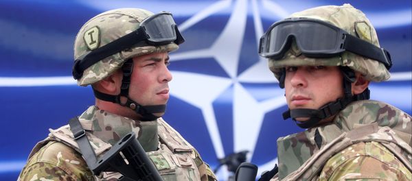 Georgian servicemen stand at the opening of a joint NATO-Georgia training center outside Tbilisi, Georgia, Thursday, Aug. 27, 2015 Georgian servicemen stand at the opening of a joint NATO-Georgia training center outside Tbilisi, Georgia, Thursday, Aug. 27, 2015 - Sputnik International
