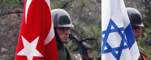 Turkish honour guard soldiers hold an Israeli, right, and Turkish flag, left, after Israeli Defense Minister Ehud Barak and his Turkish counterpart Vecdi Gonul reviewed the military guard of honour before their talks in Ankara, Turkey, Sunday, Jan. 17, 2010 Turkish honour guard soldiers hold an Israeli, right, and Turkish flag, left, after Israeli Defense Minister Ehud Barak and his Turkish counterpart Vecdi Gonul reviewed the military guard of honour before their talks in Ankara, Turkey, Sunday, Jan. 17, 2010 - Sputnik International