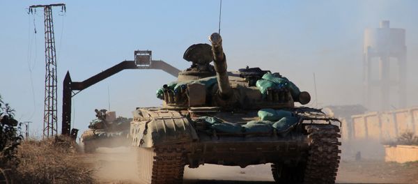 Syrian government forces' tanks drive in the village of Tal Jabin, north of the embattled city of Aleppo, as they advanced to break a three-year rebel siege of two government-held Shiite villages, Nubol and Zahraa, and take control of parts of the supply route on February 3, 2016 Syrian government forces' tanks drive in the village of Tal Jabin, north of the embattled city of Aleppo, as they advanced to break a three-year rebel siege of two government-held Shiite villages, Nubol and Zahraa, and take control of parts of the supply route on February 3, 2016 - Sputnik International