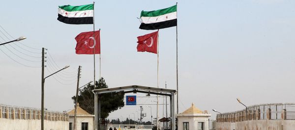 Free Syrian Army and Turkish flags flutter over the Bab Al-Salam border crossing, that is closed from the Turkish side, activists said, in northern Aleppo countryside, Syria, January 18, 2016 Free Syrian Army and Turkish flags flutter over the Bab Al-Salam border crossing, that is closed from the Turkish side, activists said, in northern Aleppo countryside, Syria, January 18, 2016 - Sputnik International