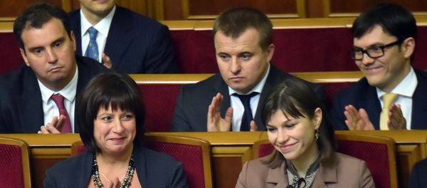 Ukrainian Minister of Economic Development Aivaras Abromavicius (L) applauding during a session of parliament in Kiev, December 2, 2014. Ukrainian Minister of Economic Development Aivaras Abromavicius (L) applauding during a session of parliament in Kiev, December 2, 2014. - Sputnik International