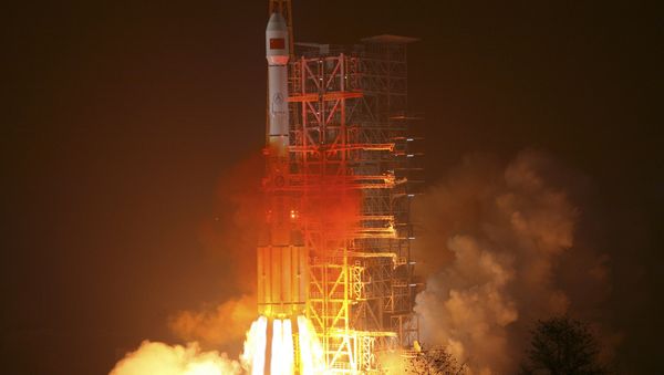 In this photo released by the Xinhua news agency, an orbiter is launched by a Long March-3III carrier rocket from the Xichang Satellite Launch Center in southwest China's Sichuan Province, on Sunday Jan. 17, 2010 In this photo released by the Xinhua news agency, an orbiter is launched by a Long March-3III carrier rocket from the Xichang Satellite Launch Center in southwest China's Sichuan Province, on Sunday Jan. 17, 2010 - Sputnik International