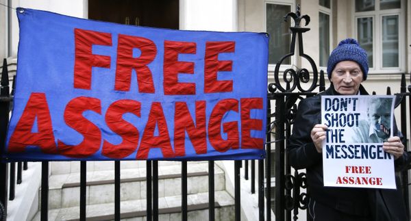 A demonstrator holds a banner outside the Ecuadorean Embassy in London, where Wikileaks founder Julian Assange is staying, Thursday, Feb. 4, 2016 A demonstrator holds a banner outside the Ecuadorean Embassy in London, where Wikileaks founder Julian Assange is staying, Thursday, Feb. 4, 2016 - Sputnik International