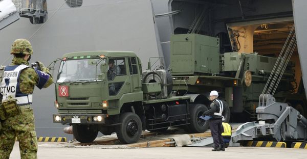 A Japanese Self-Defense Forces' vehicle carrying units of Patriot Advanced Capability-3 (PAC-3) missiles leaves a port on Japan's southern island of Ishigaki, Okinawa prefecture, in this photo taken by Kyodo February 6, 2016. A Japanese Self-Defense Forces' vehicle carrying units of Patriot Advanced Capability-3 (PAC-3) missiles leaves a port on Japan's southern island of Ishigaki, Okinawa prefecture, in this photo taken by Kyodo February 6, 2016. - Sputnik International