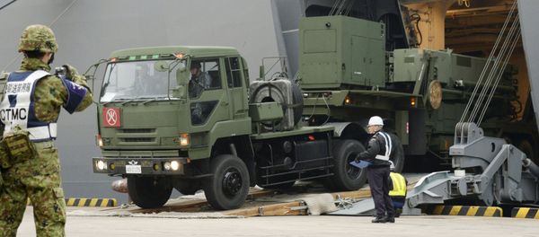 A Japanese Self-Defense Forces' vehicle carrying units of Patriot Advanced Capability-3 (PAC-3) missiles leaves a port on Japan's southern island of Ishigaki, Okinawa prefecture, in this photo taken by Kyodo February 6, 2016. A Japanese Self-Defense Forces' vehicle carrying units of Patriot Advanced Capability-3 (PAC-3) missiles leaves a port on Japan's southern island of Ishigaki, Okinawa prefecture, in this photo taken by Kyodo February 6, 2016. - Sputnik International