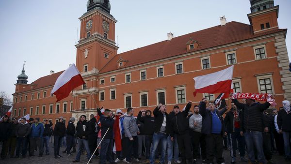 Protesters shout slogans during anti-immigrant rally in front of the Royal Castle in Warsaw, Poland February 6, 2016. Protesters shout slogans during anti-immigrant rally in front of the Royal Castle in Warsaw, Poland February 6, 2016. - Sputnik International