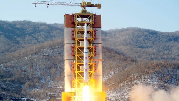 A North Korean long-range rocket is launched into the air at the Sohae rocket launch site, North Korea A North Korean long-range rocket is launched into the air at the Sohae rocket launch site, North Korea - Sputnik International