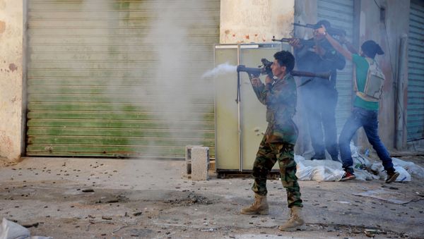 Libyan military soldiers fire their weapons during clashes with Islamic militias in Benghazi. Libya. (File) Libyan military soldiers fire their weapons during clashes with Islamic militias in Benghazi. Libya. (File) - Sputnik International