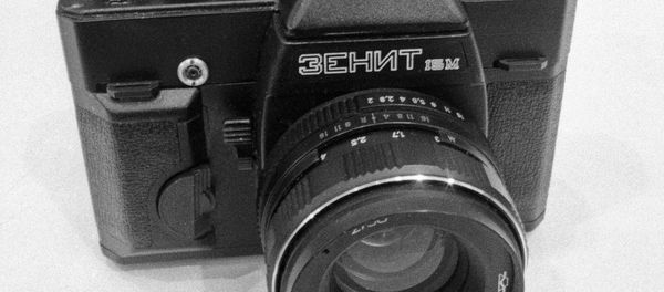 New Soviet 35-mm Zenit photo camera 15M at a wholesale fair of recreation and leisure goods. (File) - Sputnik International