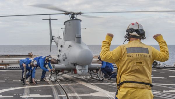 A MQ-8B Fire Scout UAS is tested off the Coast Guard Cutter Bertholf near Los Angeles, Dec. 5, 2014 A MQ-8B Fire Scout UAS is tested off the Coast Guard Cutter Bertholf near Los Angeles, Dec. 5, 2014 - Sputnik International