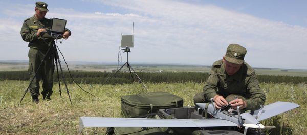 Servicemen prepare a Zastava unmanned aerial vehicle for launch in the assembly area of combined forces of the Central Military District and airborne troops at the Chebarkul firing range as part of a sudden operational readiness test Servicemen prepare a Zastava unmanned aerial vehicle for launch in the assembly area of combined forces of the Central Military District and airborne troops at the Chebarkul firing range as part of a sudden operational readiness test - Sputnik International