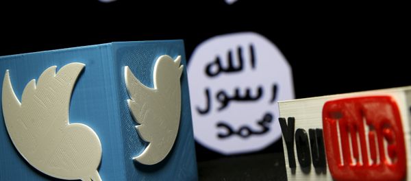A 3D plastic representation of the Twitter and Youtube logo is seen in front of a displayed ISIS flag in this photo illustration in Zenica, Bosnia and Herzegovina, February 3, 2016 A 3D plastic representation of the Twitter and Youtube logo is seen in front of a displayed ISIS flag in this photo illustration in Zenica, Bosnia and Herzegovina, February 3, 2016 - Sputnik International